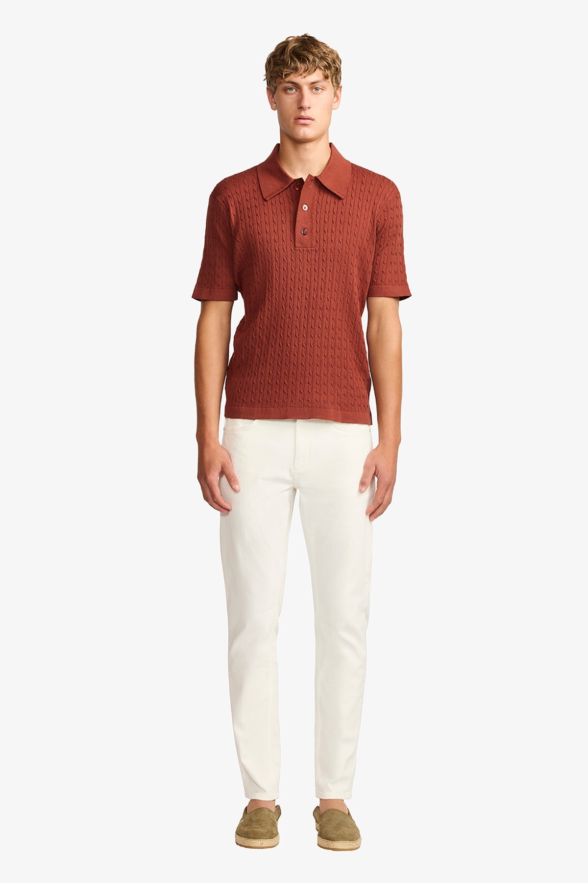 Image of a model wearing Tops. Product name - Evan burgundy knitted cable Polo in Burgundy colour by brand - Anthony Squires