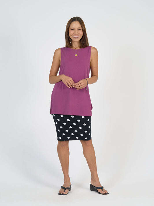 Image of a model wearing Skirts. Product name - Midi Bamboo Whitney Tube Skirt Polka Dot in Polka Dot colour by brand - Lou Lou