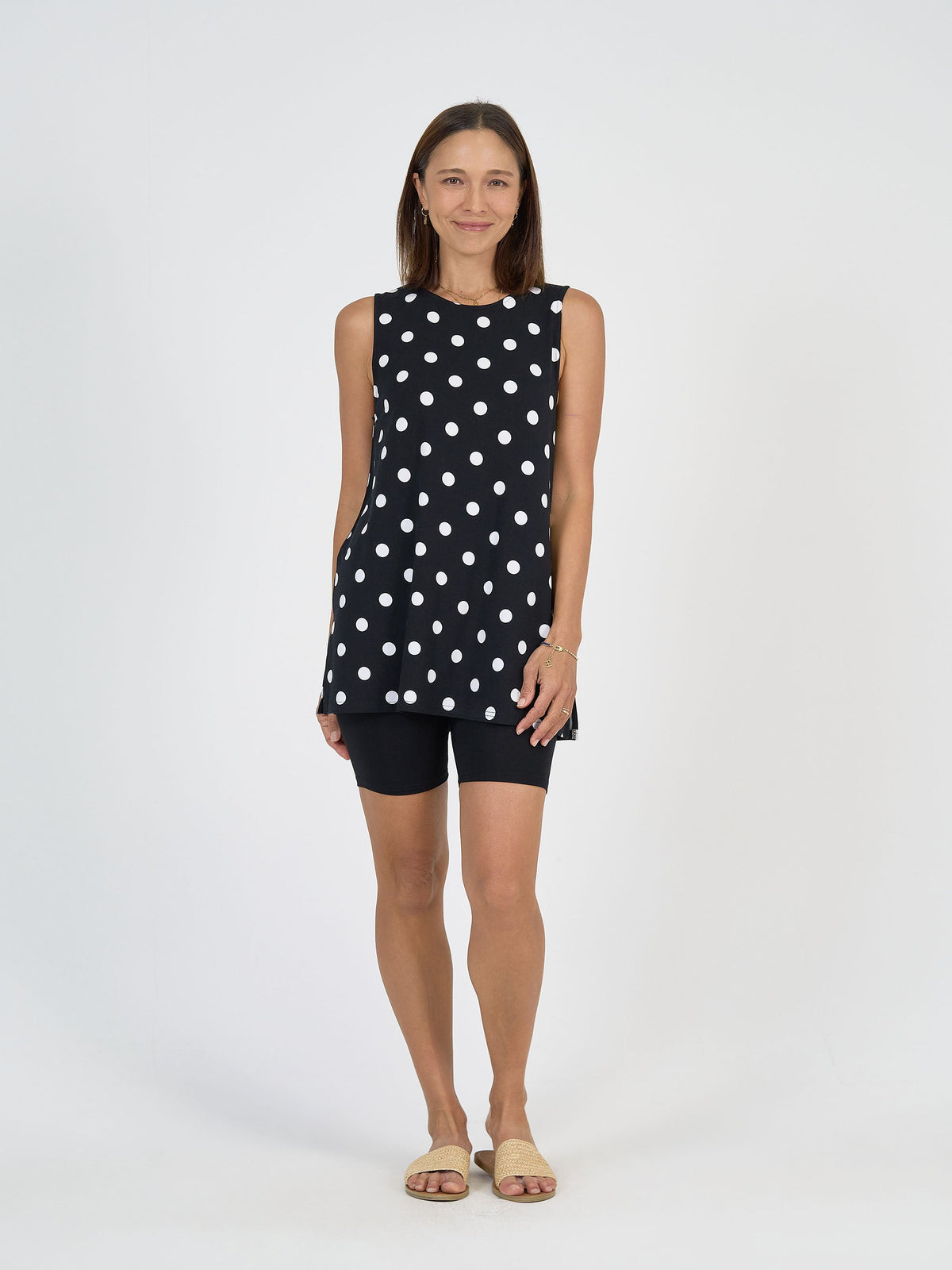 Image of a model wearing Tops. Product name - Fantasia Bamboo Tunic Top Polka Dot in Polka Dot colour by brand - Lou Lou
