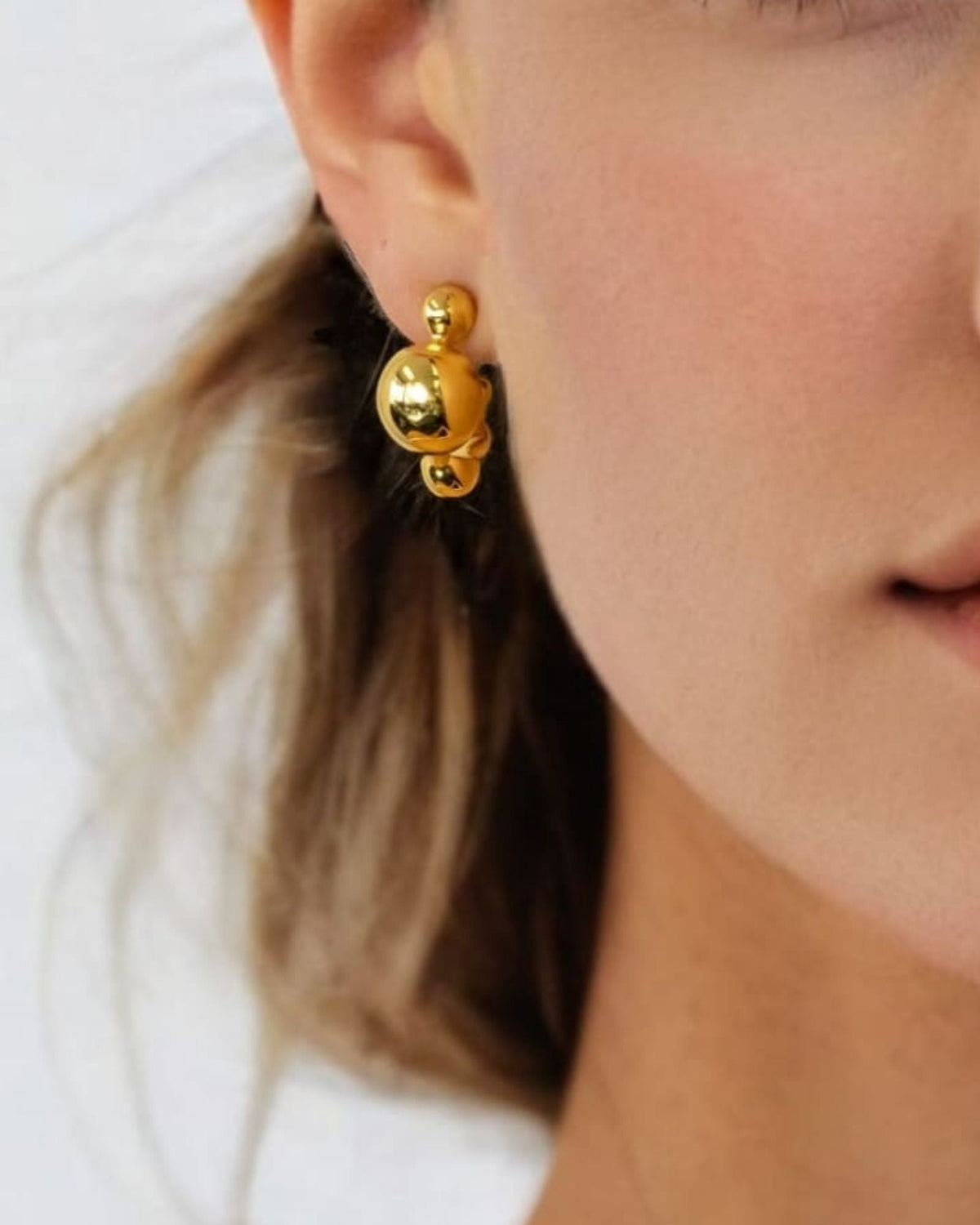 LAVANA Floating Pebble Silver Huggie Earrings