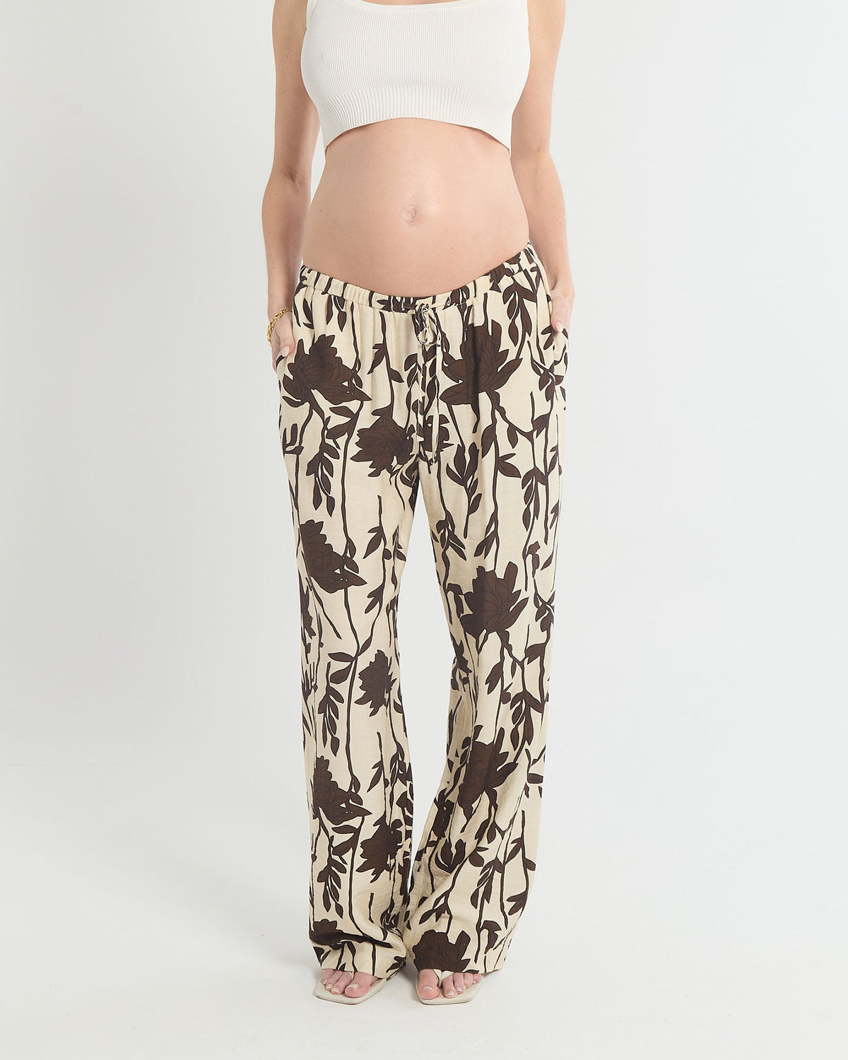 Image of a model wearing Pants. Product name - Flowy Wide Leg Pants in colour by brand - Soon Maternity
