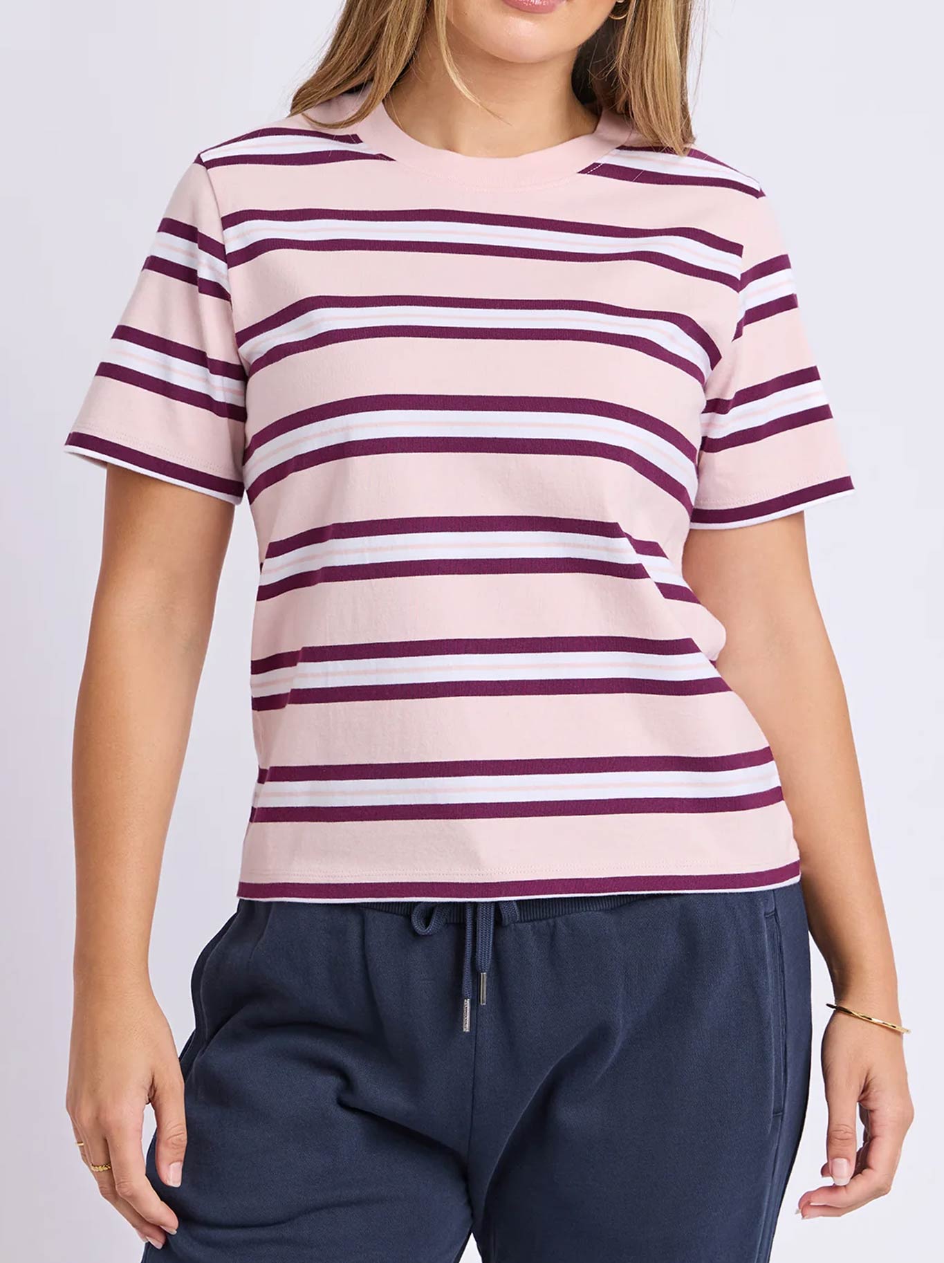 Image of a model wearing Tops. Product name - FOXWOOD PURE STRIPE TEE in Ballerina colour by brand - Foxwood