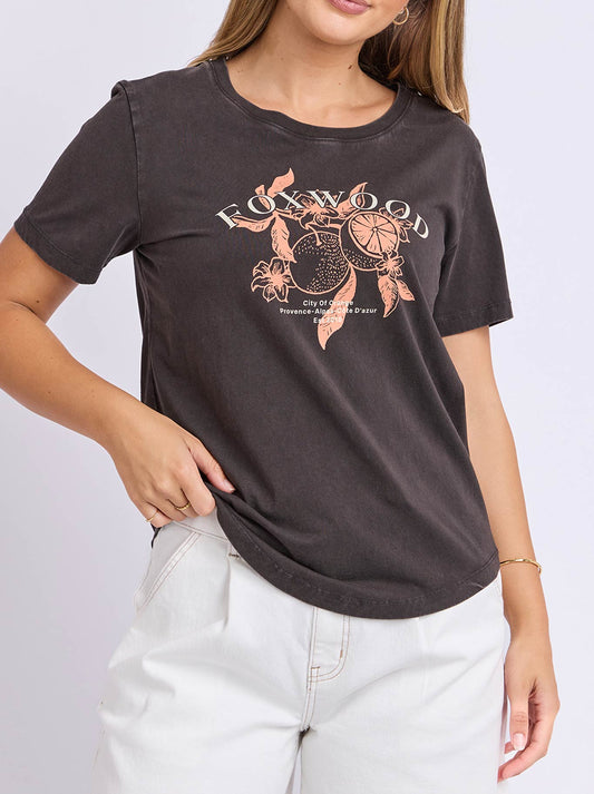 Image of a model wearing Tops. Product name - Foxwood Citrus Tee in Washed Black colour by brand - Foxwood