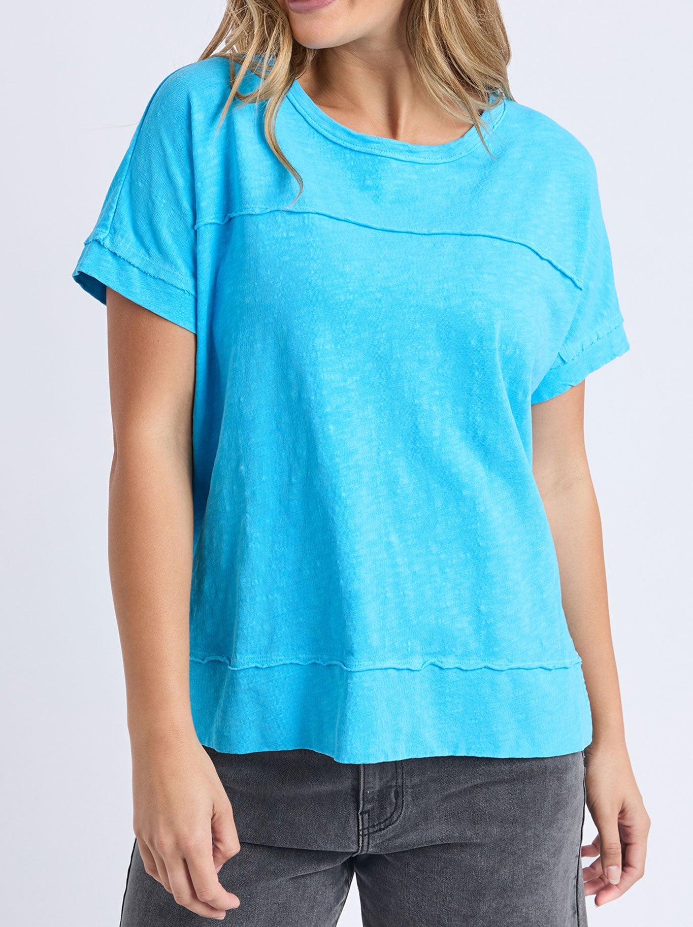 Image of a model wearing Tops. Product name - Foxwood Allison Tee in Aqua colour by brand - Foxwood