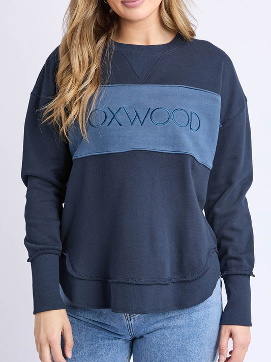 Image of a model wearing Tops. Product name - Foxwood Simplified Tonal Crew in Navy colour by brand - Foxwood