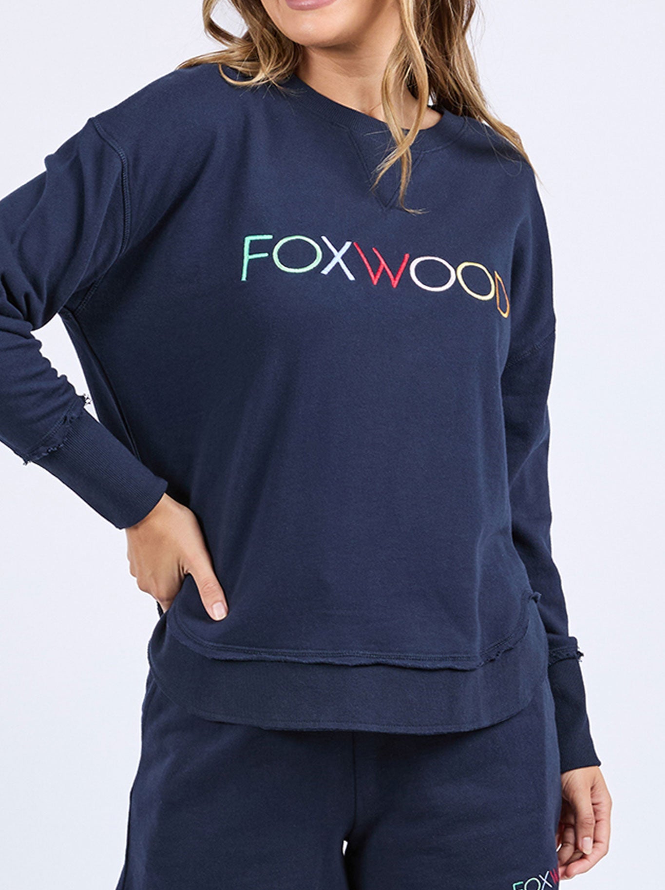 Image of a model wearing Tops. Productname: Simplified Confetti Crew in Navy A colour by brand - Foxwood