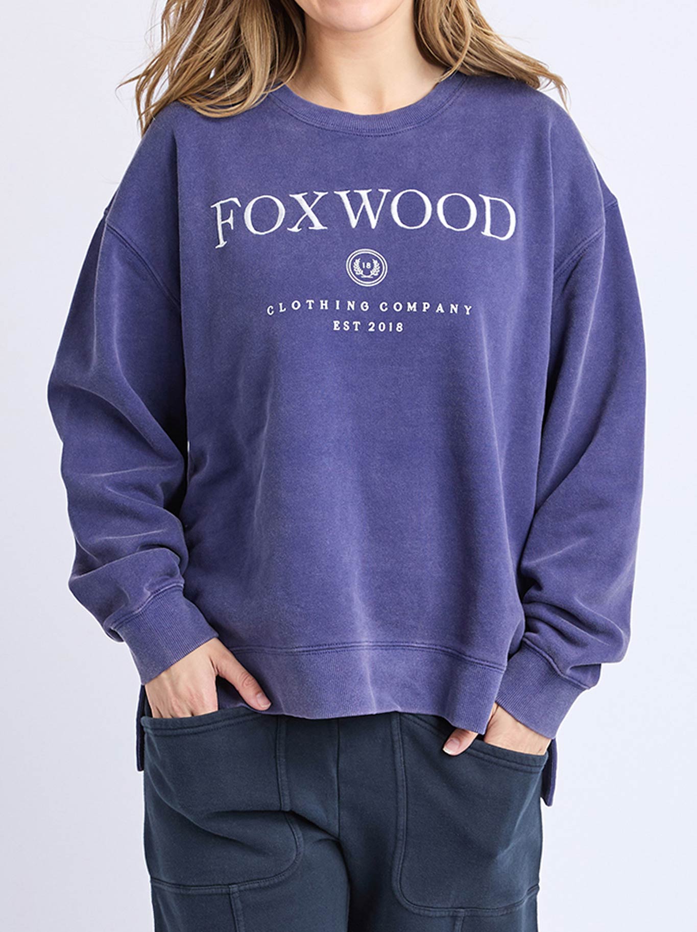 Image of a model wearing Tops. Product name - Foxwood Core Crew in Midnight colour by brand - Foxwood
