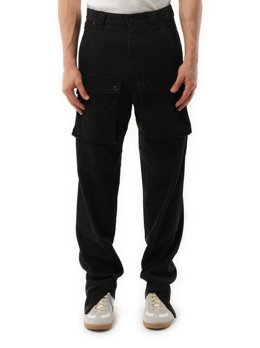 Image of a model wearing Denim. Productname: OFF-WHITE Pivot Workwear Vintage Jeans in BLACK colour by brand - OFF-WHITE