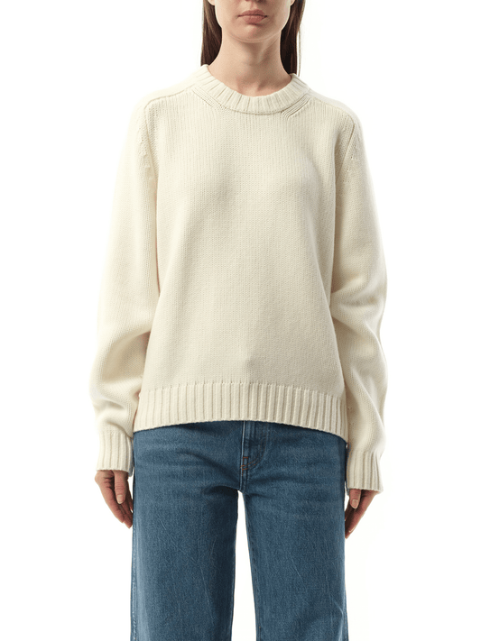 Image of a model wearing Outerwear. Productname: KHAITE Mae Sweater in WHITE colour by brand - KHAITE