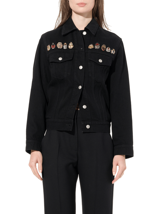 Image of a model wearing Denim. Productname: ALEXANDER MCQUEEN Washed Denim Jacket in Black colour by brand - ALEXANDER MCQUEEN