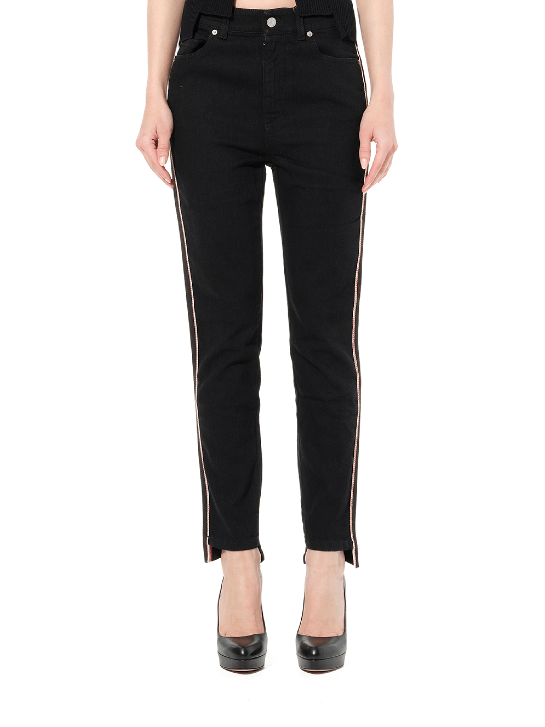 Image of a model wearing Denim. Productname: ALEXANDER MCQUEEN Emb Denim Jeans in Black colour by brand - ALEXANDER MCQUEEN