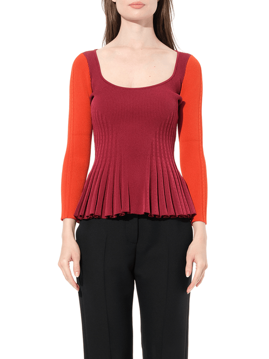 Image of a model wearing Outerwear. Productname: ALEXANDER MCQUEEN Scoop Knitwear in Rose colour by brand - ALEXANDER MCQUEEN