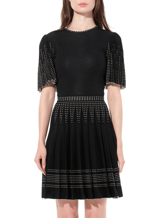 Image of a model wearing Dress. Productname: ALEXANDER MCQUEEN Knit Jacquard Dress in Black White colour by brand - ALEXANDER MCQUEEN