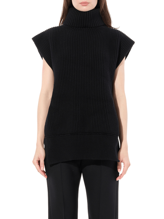 Image of a model wearing Outerwear. Productname: ALEXANDER MCQUEEN Turtle Neck Knitwear in Black colour by brand - ALEXANDER MCQUEEN