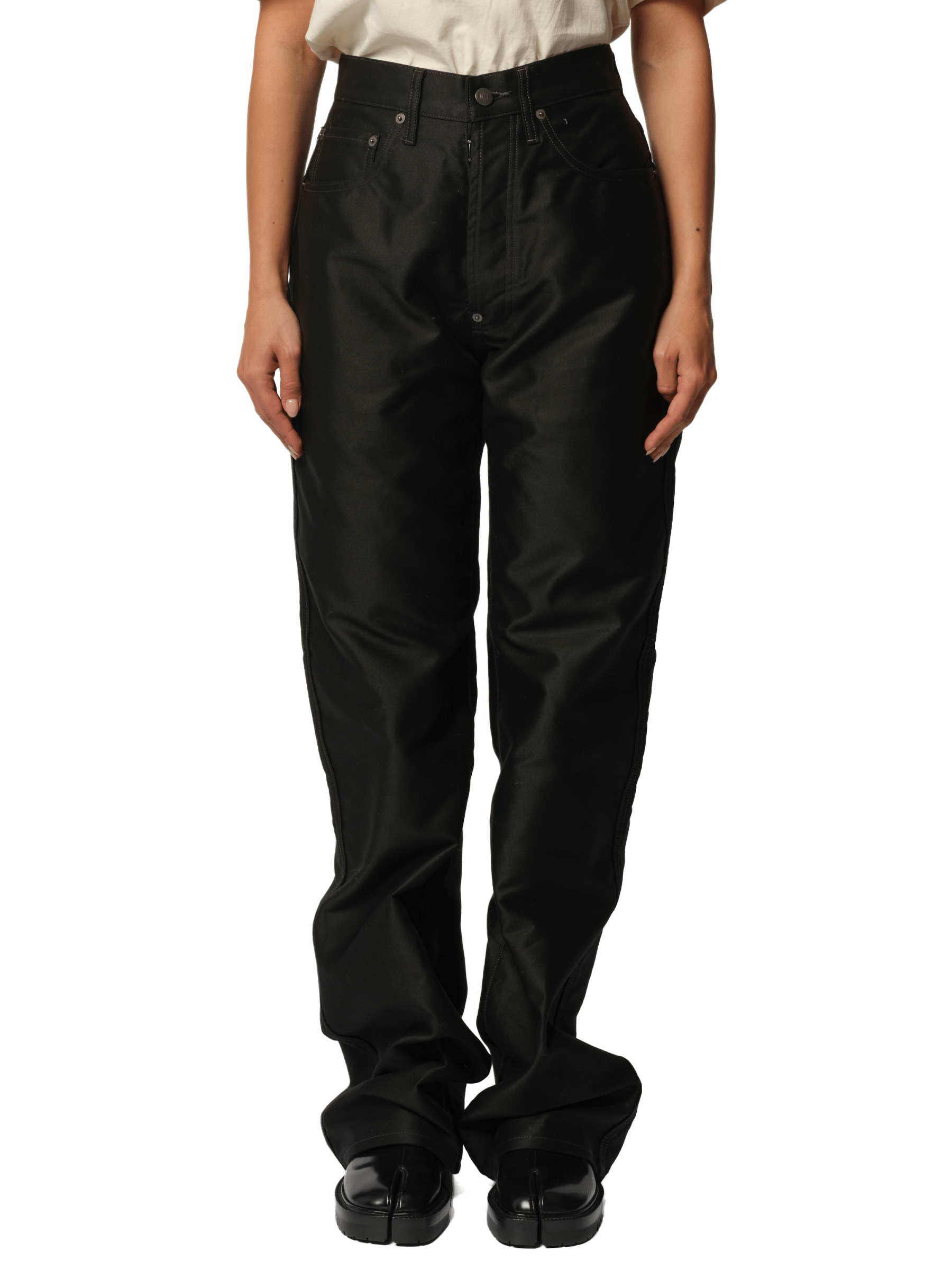 Image of a model wearing Pants. Productname: MAISON MARGIELA Cotton Satin 5 Pocket Pants in Black colour by brand - MAISON MARGIELA