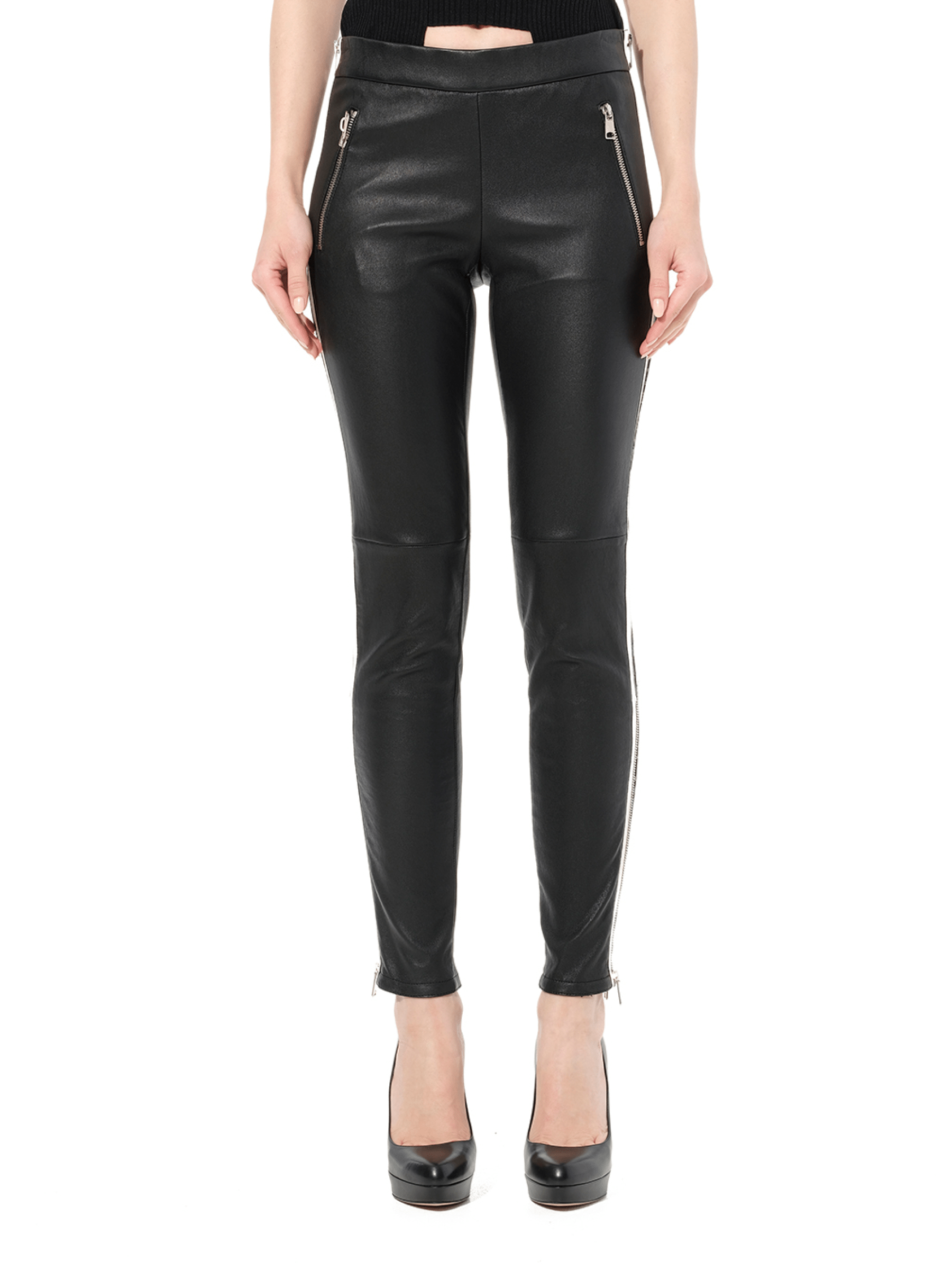 Image of a model wearing Pants. Product name - Leather Leggings in Black colour by brand - ALEXANDER MCQUEEN