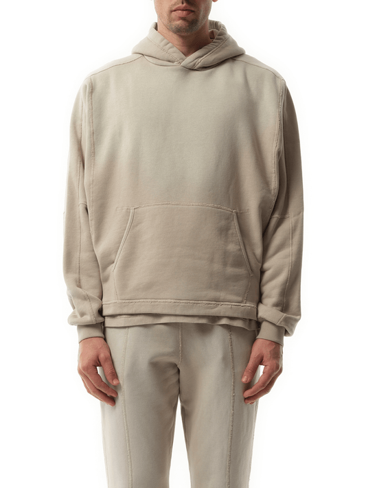 Image of a model wearing Outerwear. Productname: REPRESENT Step Hem Hoodie in BROWN colour by brand - REPRESENT