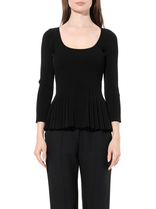 Image of a model wearing Outerwear. Productname: ALEXANDER MCQUEEN Scoop Pleated Knitwear in Black colour by brand - ALEXANDER MCQUEEN