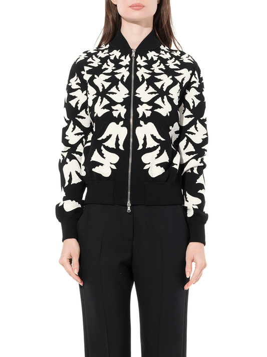 Image of a model wearing Outerwear. Productname: ALEXANDER MCQUEEN Knit Jacket in Black colour by brand - ALEXANDER MCQUEEN