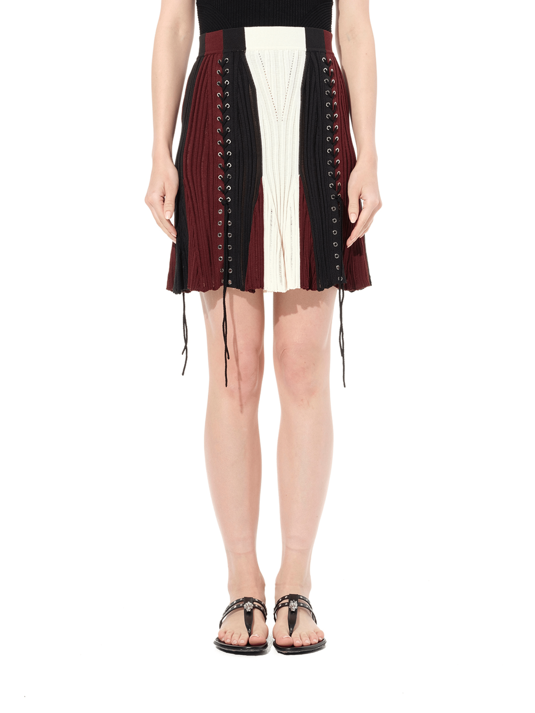 Image of a model wearing Skirts. Productname: ALEXANDER MCQUEEN Laddered Mini Skirt in Black colour by brand - ALEXANDER MCQUEEN