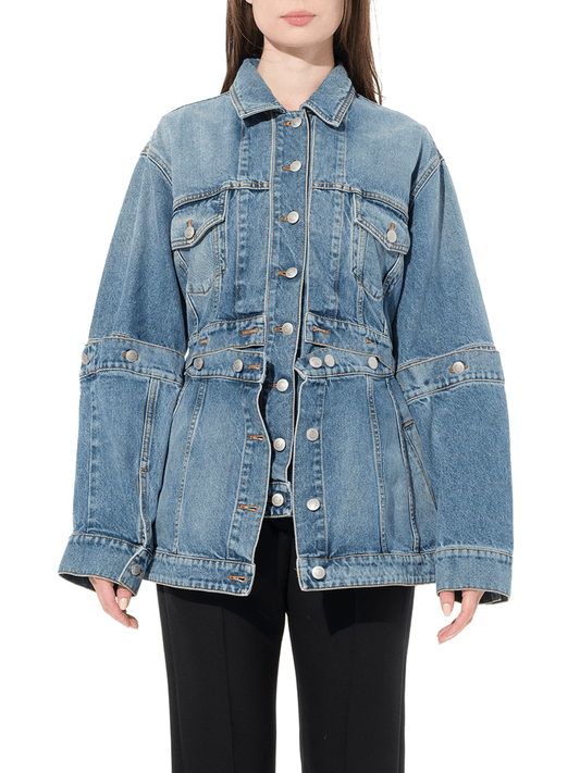 Image of a model wearing Denim. Productname: ALEXANDER MCQUEEN Slash Denim Jacket in Vintage colour by brand - ALEXANDER MCQUEEN