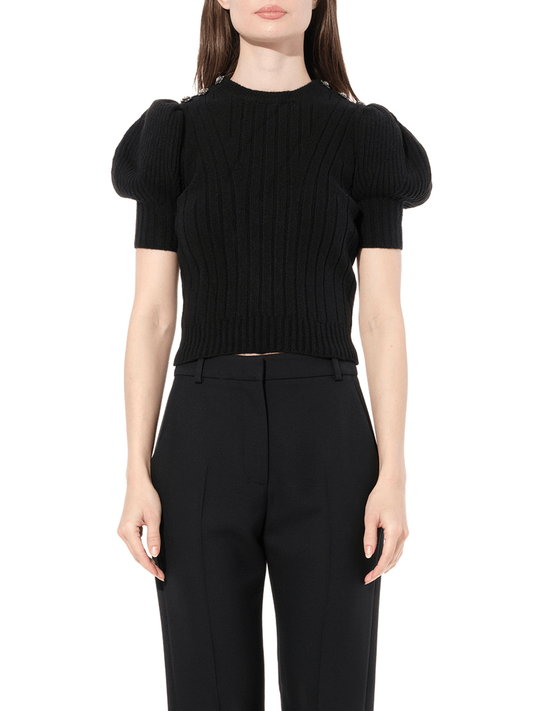 Image of a model wearing Tops. Productname: ALEXANDER MCQUEEN Ribbed Top with Jewel in BLACK colour by brand - ALEXANDER MCQUEEN