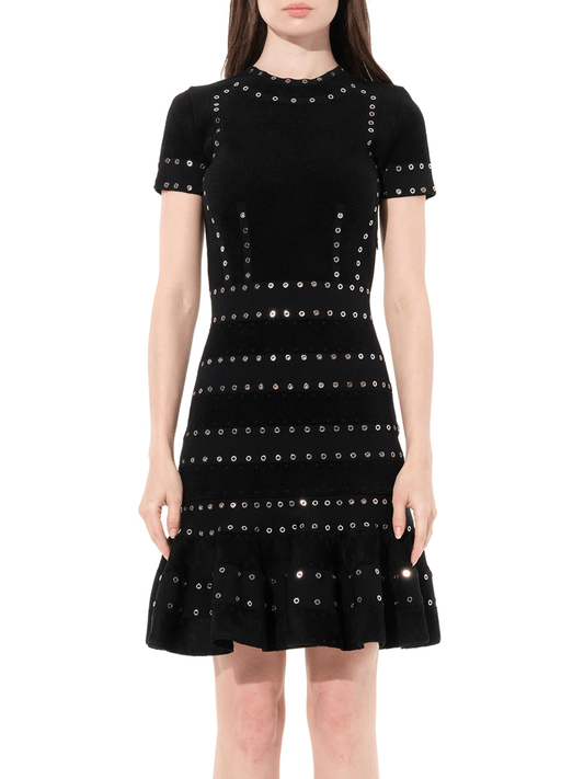 Image of a model wearing Dress. Productname: ALEXANDER MCQUEEN Eyelet Mini Dress in Black colour by brand - ALEXANDER MCQUEEN