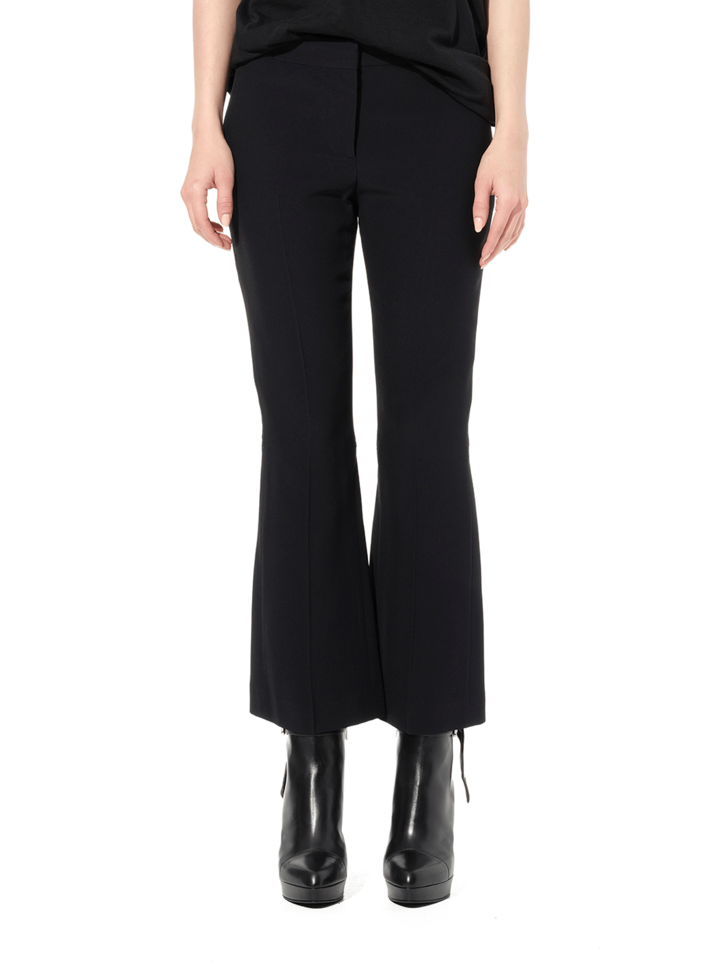 Image of a model wearing Pants. Productname: ALEXANDER MCQUEEN Leaf Eye Kick Pants in Black colour by brand - ALEXANDER MCQUEEN