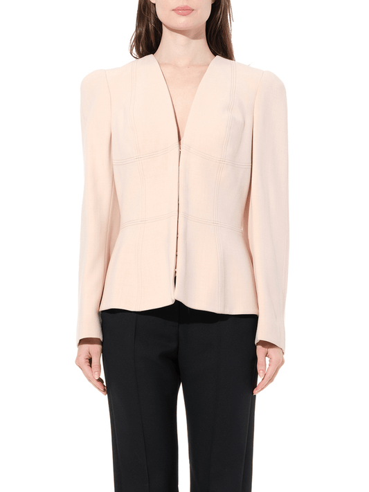 Image of a model wearing Outerwear. Productname: ALEXANDER MCQUEEN Wool Jacket in Cream colour by brand - ALEXANDER MCQUEEN