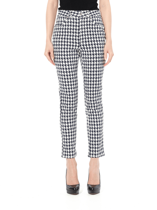 Image of a model wearing Denim. Productname: ALEXANDER MCQUEEN Dogtooth Jeans in White colour by brand - ALEXANDER MCQUEEN
