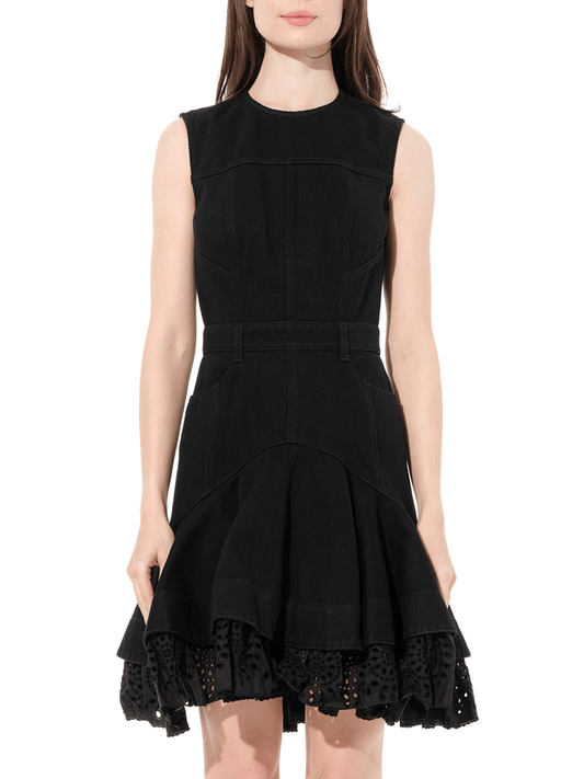 Image of a model wearing Denim. Productname: ALEXANDER MCQUEEN Mini Denim Dress in Black colour by brand - ALEXANDER MCQUEEN