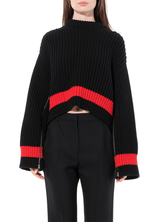 Image of a model wearing Outerwear. Productname: ALEXANDER MCQUEEN Chunky Rib Knitwear in Black colour by brand - ALEXANDER MCQUEEN