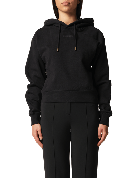 Image of a model wearing Outerwear. Productname: JACQUEMUS Le Hoodie Gros Grain in Black colour by brand - JACQUEMUS