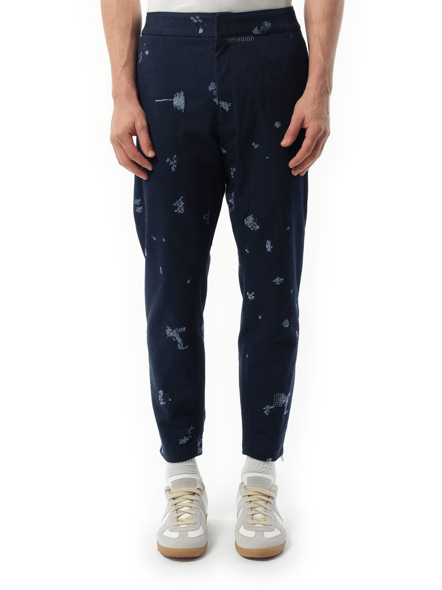 Image of a model wearing Pants. Productname: ALEXANDER MCQUEEN EMB Sweatpants in BLUE colour by brand - ALEXANDER MCQUEEN