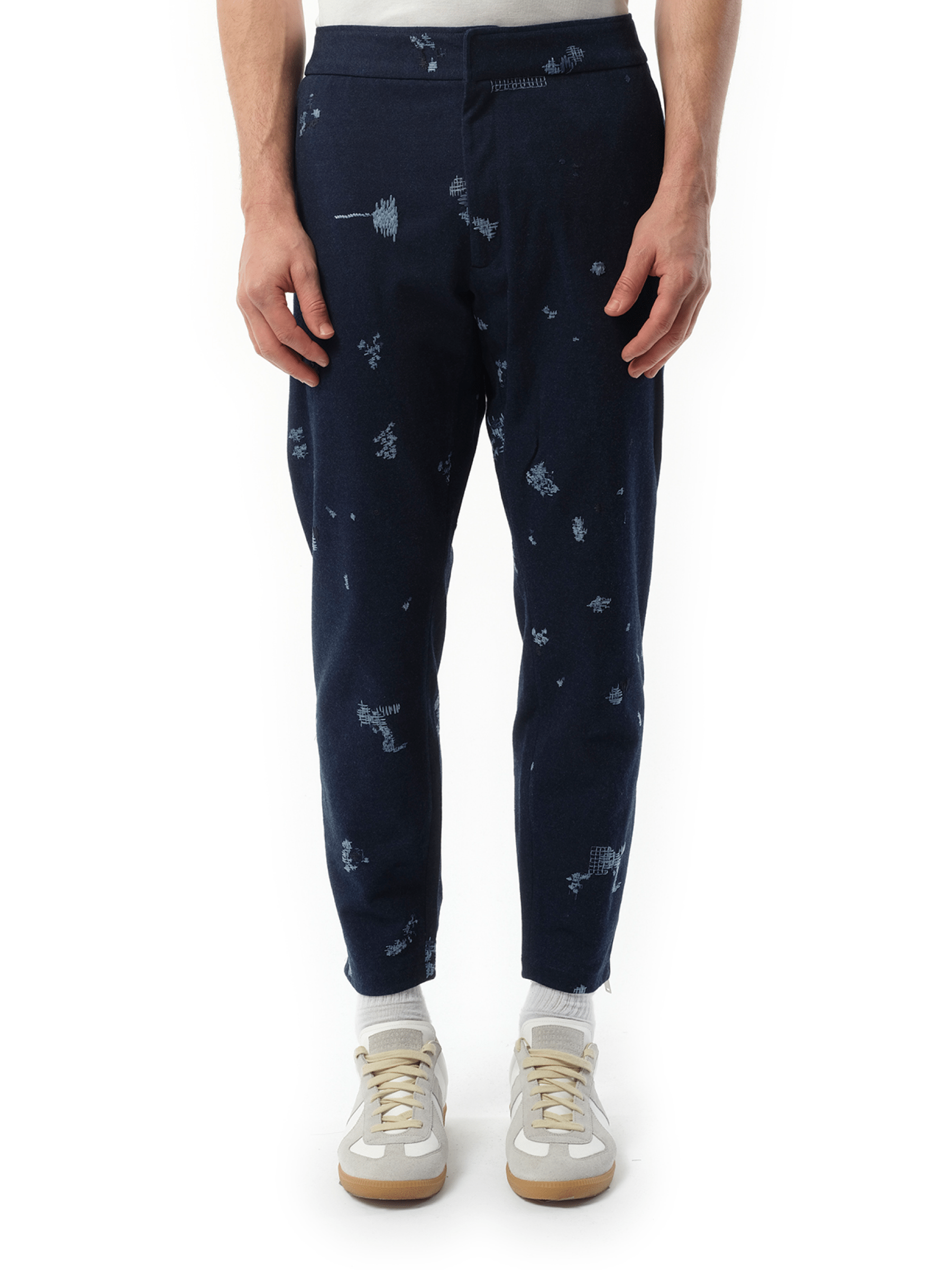 Image of a model wearing Pants. Productname: ALEXANDER MCQUEEN EMB Sweatpants in BLUE colour by brand - ALEXANDER MCQUEEN