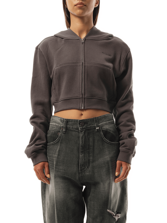 Image of a model wearing Outerwear. Productname: WE11DONE Womens Pearl Bear Hoodie Zip-Up in CHARCOAL colour by brand - WE11DONE