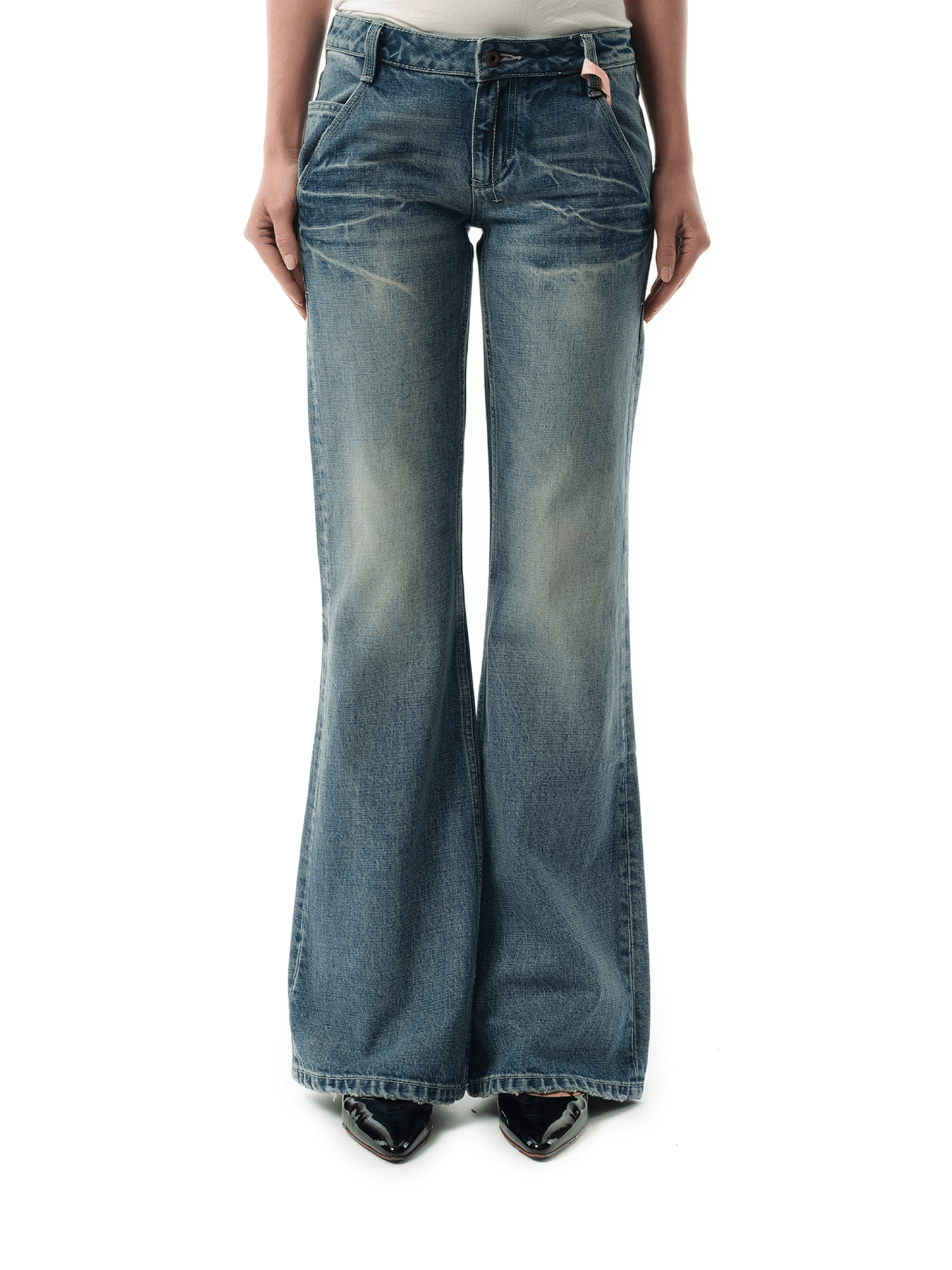 Image of a model wearing Denim. Productname: FAX COPY EXPRESS Low-rise Slim Fit Flared Jeans in BLUE colour by brand - FAX COPY EXPRESS