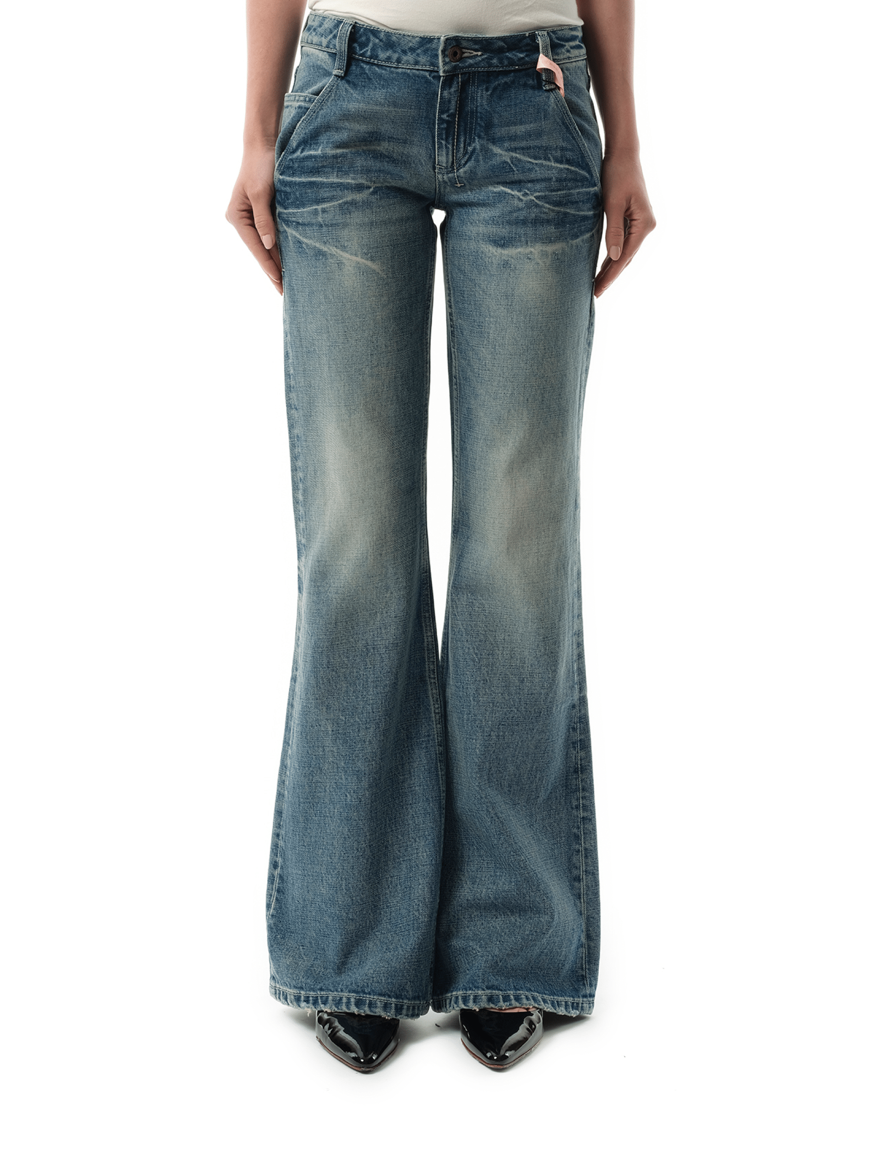 Image of a model wearing Denim. Productname: FAX COPY EXPRESS Low-rise Slim Fit Flared Jeans in BLUE colour by brand - FAX COPY EXPRESS