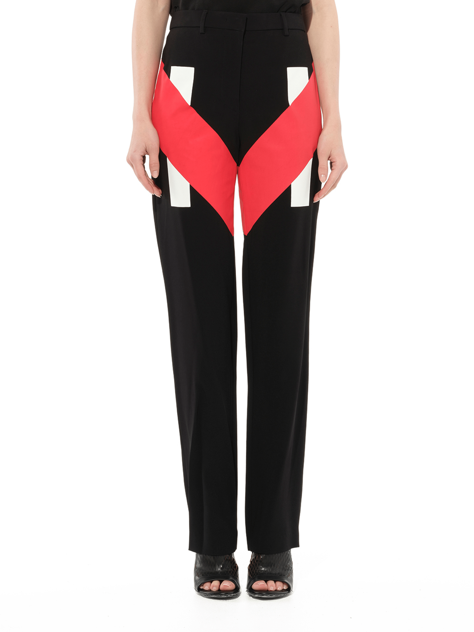 Image of a model wearing Pants. Product name - Pants in Black colour by brand - GIVENCHY