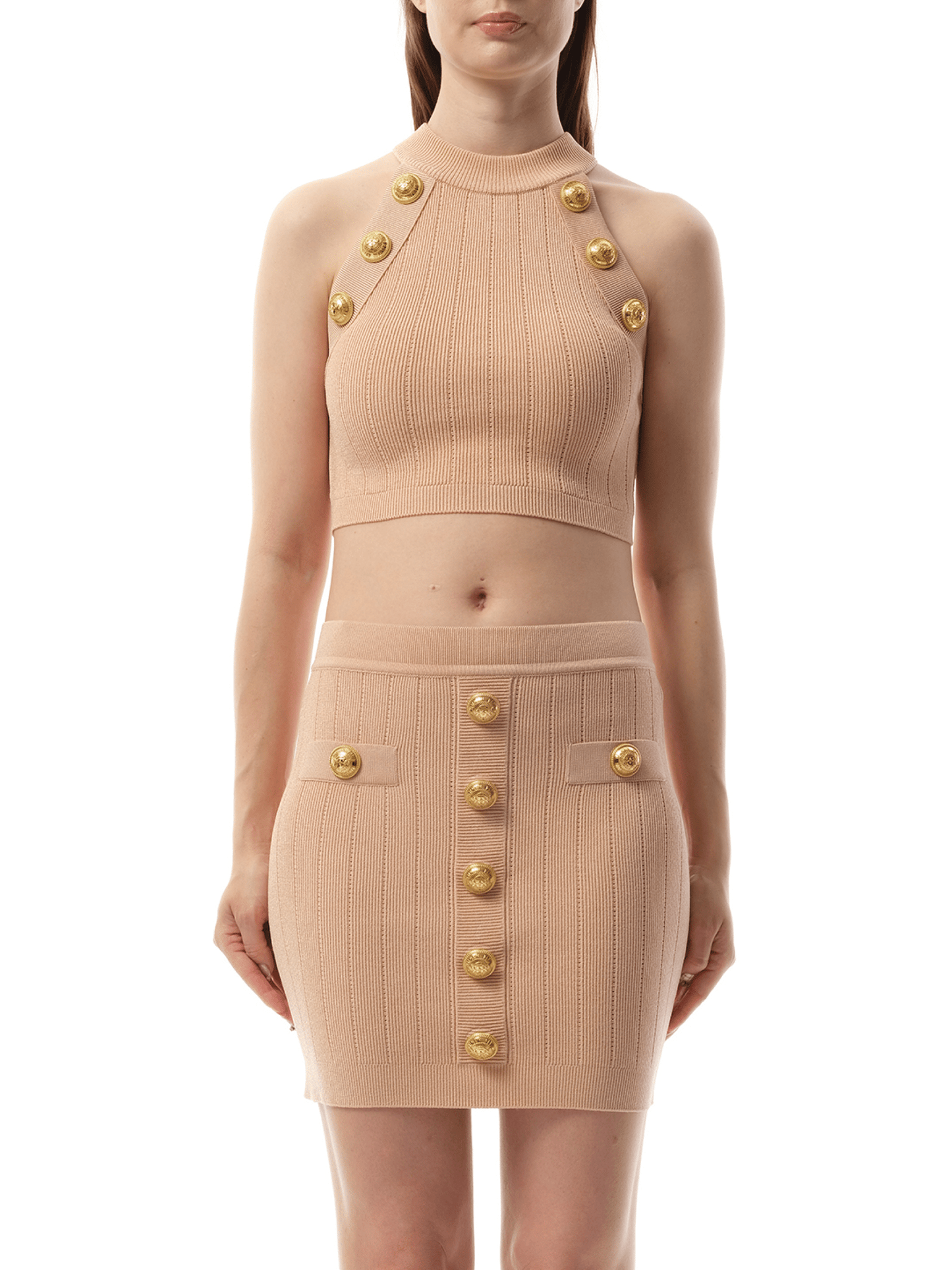 Image of a model wearing Tops. Productname: BALMAIN 6 Button Halterneck Knit Cropped Top in Nude Rose colour by brand - BALMAIN