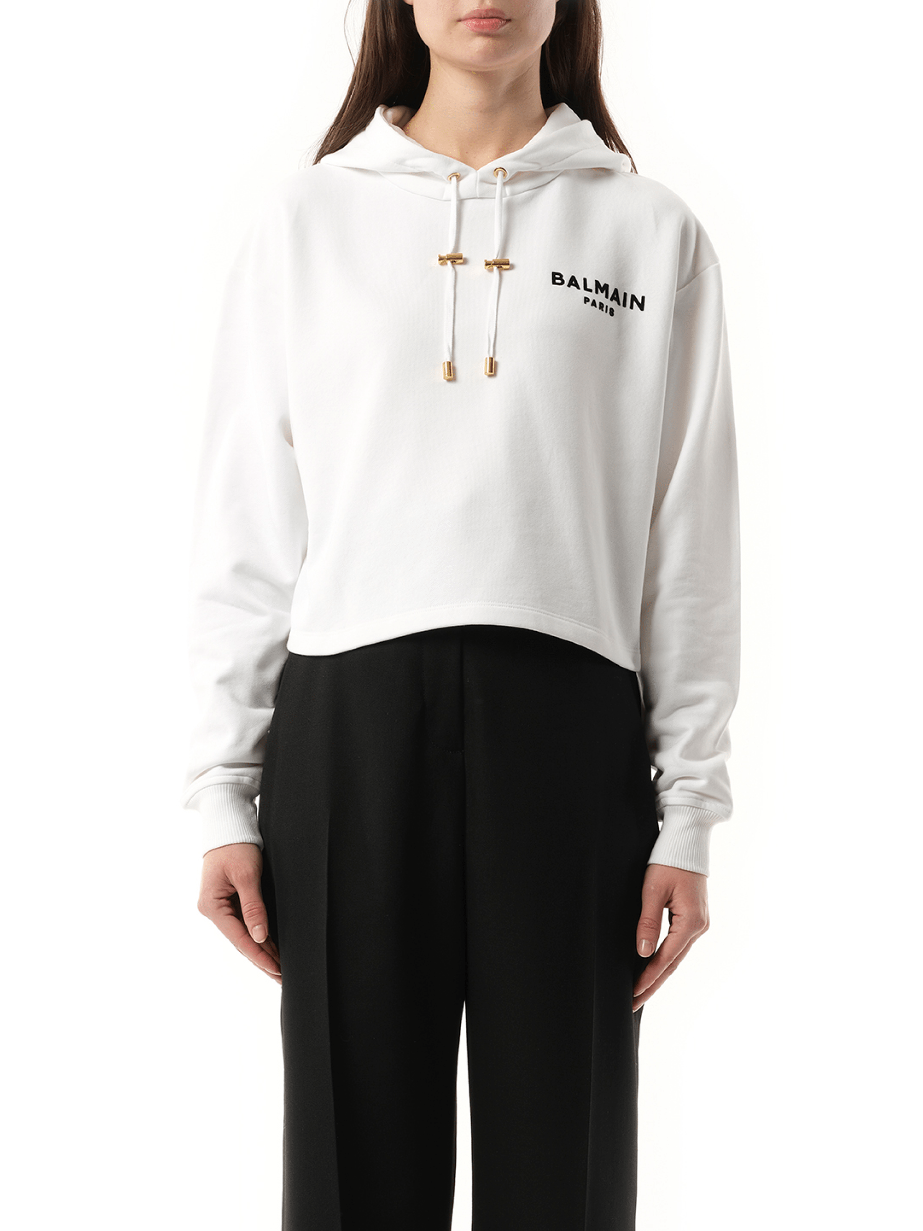 Image of a model wearing Outerwear. Productname: BALMAIN Balmain Flock Detail Cropped Hoodie in White Black colour by brand - BALMAIN