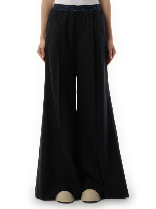 Image of a model wearing Pants. Productname: MARNI Flared Wool Trousers in NAVY colour by brand - MARNI