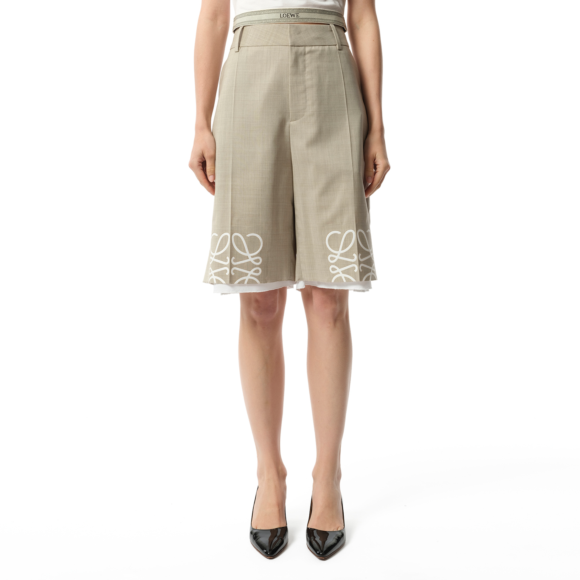 Image of a model wearing Shorts. Productname: LOEWE Anagram Shorts AF in BEIGE colour by brand - LOEWE