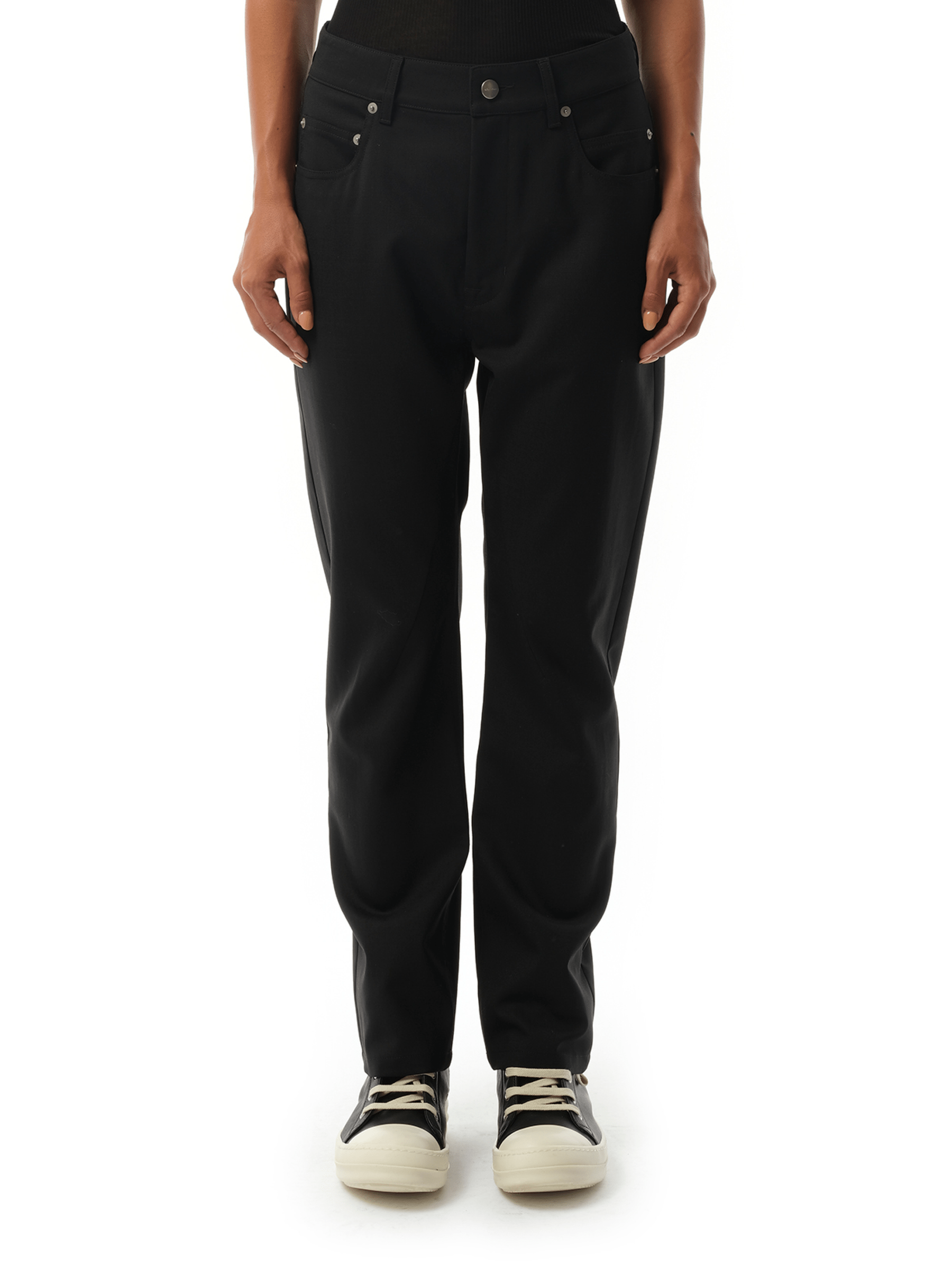 Image of a model wearing Pants. Productname: RICK OWENS Detroit Cut Pants in Black colour by brand - RICK OWENS