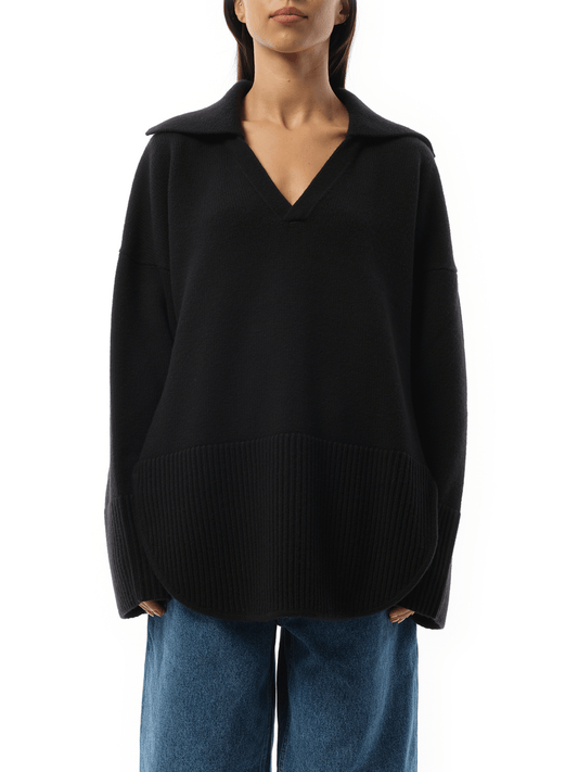 Image of a model wearing Outerwear. Productname: LOEWE V-Neck Polo Sweater in Black colour by brand - LOEWE