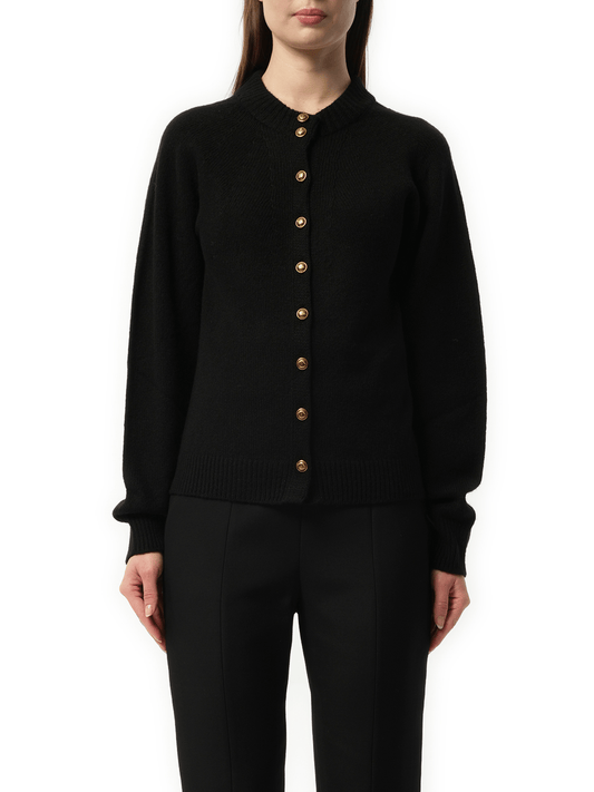 Image of a model wearing Outerwear. Productname: KHAITE Ambre Cardigan in BLACK colour by brand - KHAITE