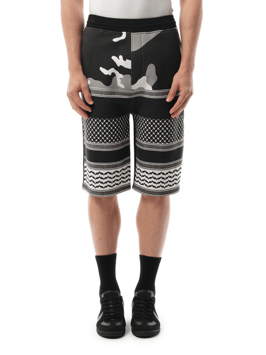 Image of a model wearing Shorts. Productname: NEIL BARRETT Shorts in GREY colour by brand - NEIL BARRETT