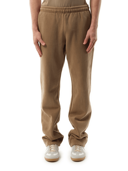 Image of a model wearing Pants. Productname: ENTIRE STUDIOS Straight-Leg Sweatpants in BROWN colour by brand - ENTIRE STUDIOS
