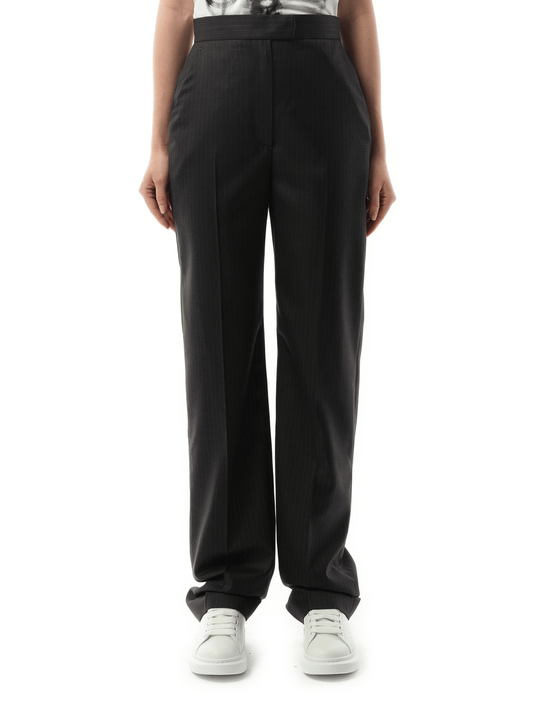 Image of a model wearing Pants. Productname: ALEXANDER MCQUEEN Straight Leg Trousers in Grey colour by brand - ALEXANDER MCQUEEN