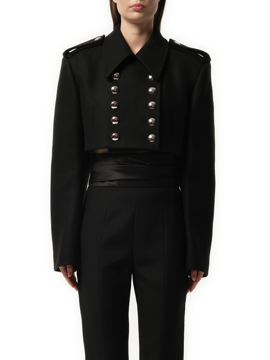 Image of a model wearing Outerwear. Productname: KHAITE Leara Jacket in Black colour by brand - KHAITE